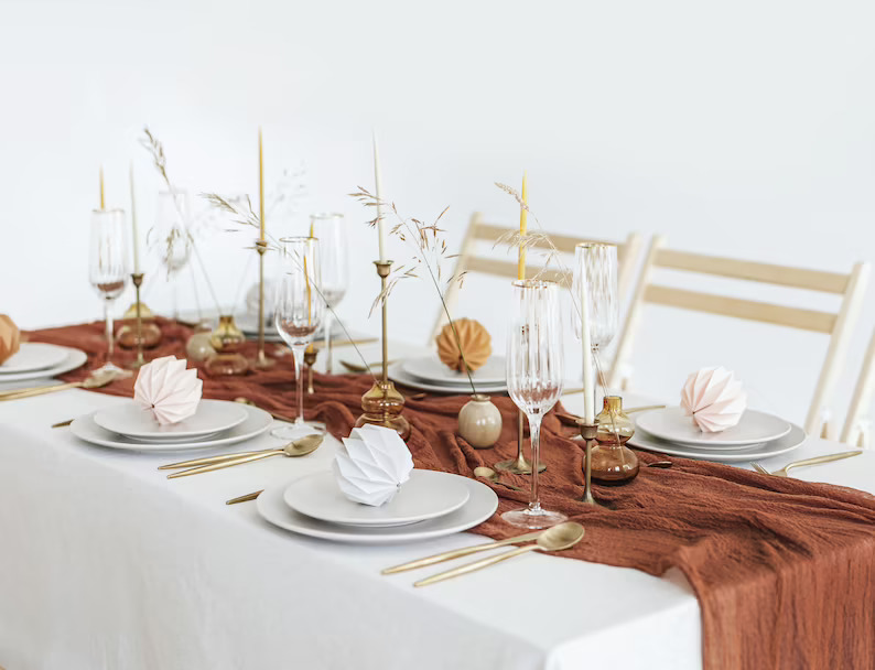 white and sage green table set up